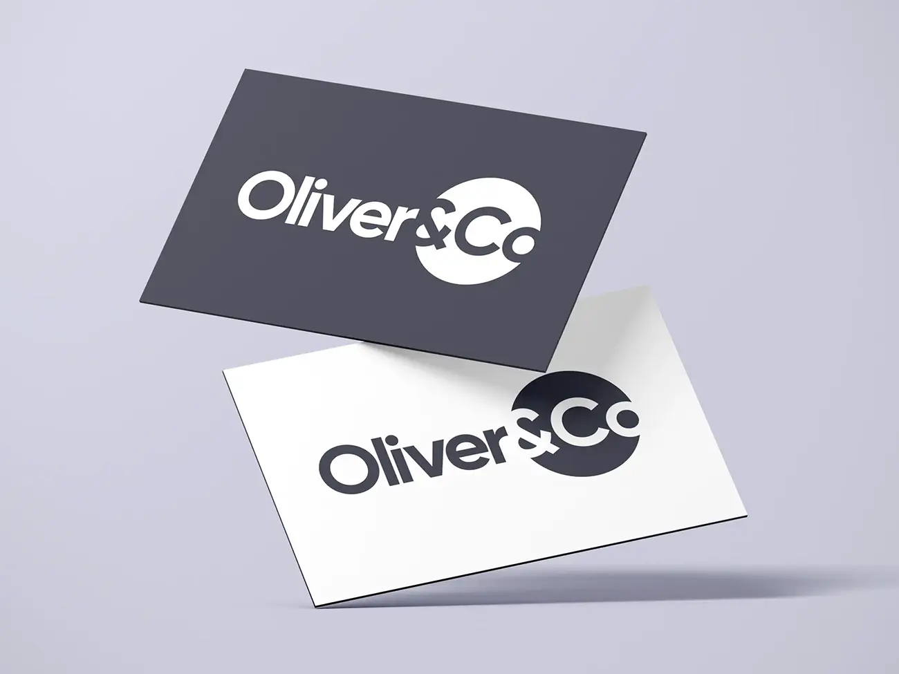2 visitkort med Oliver & Co branding